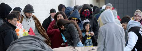 Al Hartmann  |  The Salt Lake Tribune
Hundreds of customers wait outside Salt Lake City's 2100 S. 300 W. Best Buy store just before 5 p.m. Thursday Nov. 26 before doors opened to take advantage for special deals.