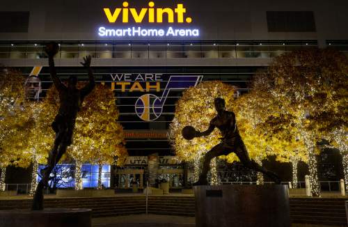 Scott Sommerdorf   |  The Salt Lake Tribune
Holiday lights ring the statues of Karl Malone and John Stockton at the Vivint Smart Home Arena, Friday, November 27, 2015.