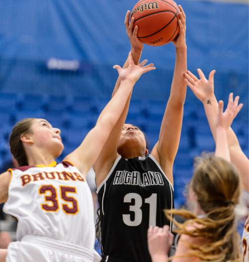 Trent Nelson  |  The Salt Lake Tribune
Mountain View's Tahlia White (35) and Highland's Fifita Tonga (31) reach for the rebound as Mountain View faces Highland in the 4A state basketball tournament at Salt Lake Community College in Taylorsville, Tuesday February 17, 2015.