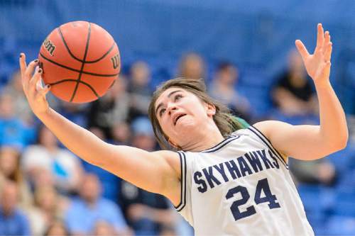 Trent Nelson  |  The Salt Lake Tribune
Salem Hills's JaneAshley Nelson (24) pulls in a rebound as Salem Hills faces Roy in the 4A state high school girls basketball tournament at Salt Lake Community College in Taylorsville, Tuesday February 17, 2015. Mountain View wins 54-49.