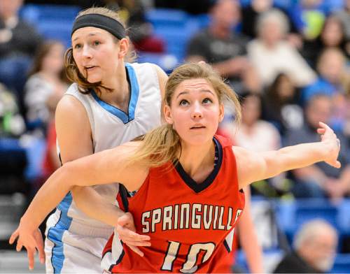 Trent Nelson  |  The Salt Lake Tribune
Sky View's Kaylee Carlsen (12) is boxed out by Springville's Savannah Sumsion (10), as Sky View faces Springville in the 4A state high school girls basketball tournament at Salt Lake Community College in Taylorsville, Tuesday February 17, 2015. Mountain View wins 54-49.