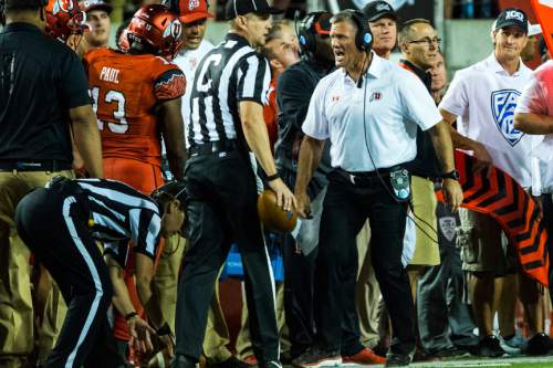 Chris Detrick  |  The Salt Lake Tribune
Utah Utes head coach Kyle Whittingham yells at Utah Utes linebacker Gionni Paul (13) after his late hit near the sidelines during the the game at Rice-Eccles Stadium Thursday September 3, 2015.  Utah defeated Michigan 24-17.