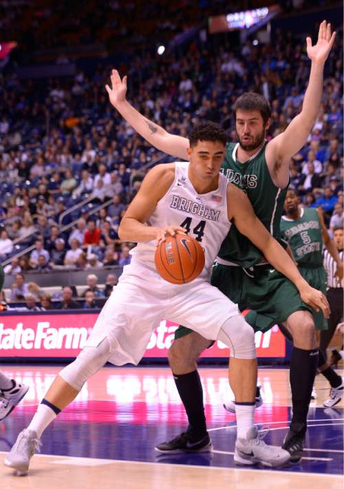 Leah Hogsten  |  The Salt Lake Tribune
Brigham Young Cougars center Corbin Kaufusi (44) fights Adams State forward Ante Mioc (33) under the net. Brigham Young University leads Adams State Grizzlies, 42-29 at the halfNovember 20, 2015 at Marriott Center, Provo.