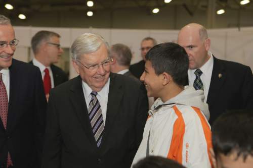 Courtesy  |  LDS Newsroom

Elder M. Russell Ballard of The Church of Jesus Christ of Latter-day Saints visits with a young man at a refugee shelter in Berlin, Germany, Monday, November 16, 2015.