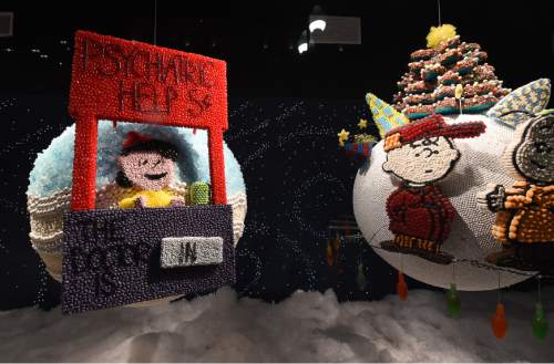Francisco Kjolseth | The Salt Lake Tribune
Macy's continues their tradition dating back to the early 1970's by unveiling it's candy windows at City Creek Center in Salt Lake on Thursday night. This year's theme features Charlie Brown and the rest of the Peanuts gang, with six windows filled with oversized holiday ornaments made entirely out of candy.