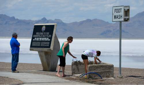 Leah Hogsten  |  The Salt Lake Tribune
Although visitors to the I-80 rest stop learn about the salt flats' racing history and get a chance to walk out onto the flats, racing and speed enthusiasts wonder whether speed weeks will continue. Levels of salt at the Bonneville Salt Flats are depleting rapidly. Many mineral extraction companies use salt from the flats, diverting the lake's natural water supply, affecting already record low lake water levels. All of these factors contribute to lack of salt on the salt flats that recharge naturally by regular flooding and ebb and flow of the salt water.