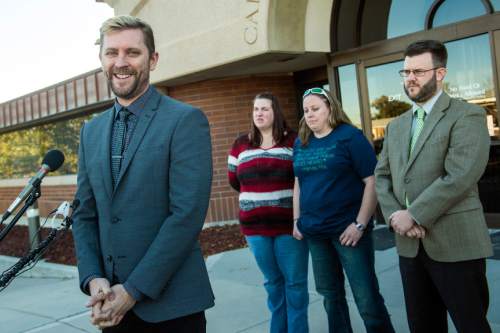 Chris Detrick  |  The Salt Lake Tribune
Equality Utah Executive Director Troy Williams, April Hoagland, Beckie Peirce and attorney Jim Hunnicutt during a press conference outside of the Juvenile Court in Price, Utah Friday November 13, 2015. Seventh District Juvenile Judge Scott Johansen has amended an order to remove a 9-month-old girl from the Price home of her same-sex foster parents and has instead scheduled a hearing on the matter.