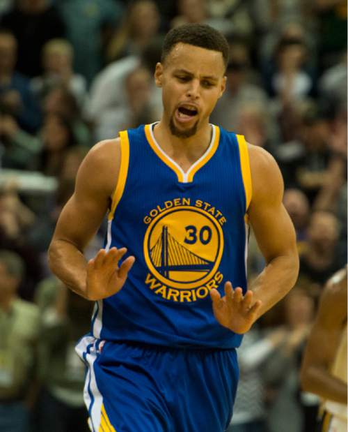 Rick Egan  |  The Salt Lake Tribune

Golden State Warriors guard Stephen Curry (30) reacts after hitting 3-point shot giving the Warriors a 104-101 lead with 49 seconds left in the game,  in NBA action the Utah Jazz vs. the Golden State Warriors, in Salt Lake City, Monday, November 30, 2015.