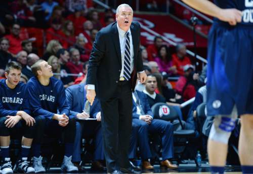 Steve Griffin  |  The Salt Lake Tribune

BYU head coach Dave Rose directs his team during first half action in the Utah versus BYU men's basketball game at the Huntsman Center in Salt Lake City, Wednesday, December 2, 2015.