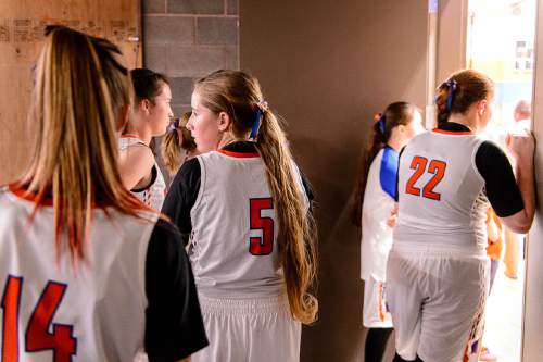 Trent Nelson  |  The Salt Lake Tribune
Water Canyon School basketball players prepare to take the court in Hildale to play the first high school basketball game in a gym that used to be the FLDS bishop's storehouse, Wednesday December 2, 2015.