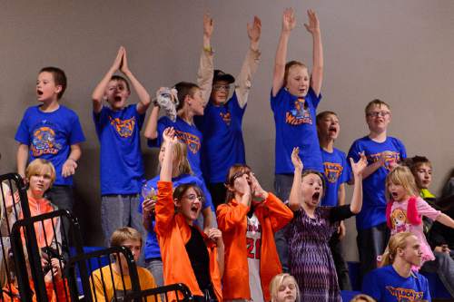 Trent Nelson  |  The Salt Lake Tribune
Water Canyon School fans cheer on their team during the first high school basketball game in the school's gym, which used to be the FLDS bishop's storehouse, in Hildale, Wednesday December 2, 2015.