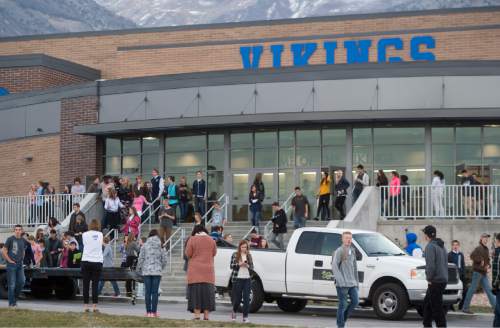 Rick Egan  |  The Salt Lake Tribune

Students leave Pleasant Grove High school, after the lockdown was lifted. A student reported seeing someone with a weapon, Thursday, December 3, 2015.