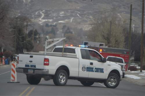 Rick Egan  |  The Salt Lake Tribune

The roads are closed during the lockdown at Pleasant Grove High school, where a student reported seeing someone with a weapon, Thursday, December 3, 2015.