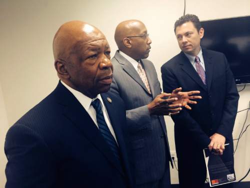 Thomas Burr  |  Tribune file photo
Rep. Elijiah Cummings, D-Md., looks on as Center for
Urban Families Executive Director Joseph Jones speaks with Rep. Jason Chaffetz, R-Utah, during a visit to the Baltimore facility. Cummings is the ranking minority member of the House Oversight Committee that soon will be led by Chaffetz.