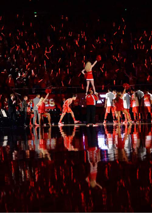 Steve Griffin  |  The Salt Lake Tribune

Fans wave light sticks as the Utes are introduced before first half action in the Utah versus BYU men's basketball game at the Huntsman Center in Salt Lake City, Wednesday, December 2, 2015.