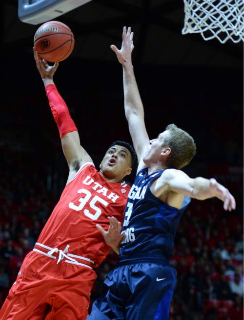 Steve Griffin  |  The Salt Lake Tribune

Utah Utes forward Kyle Kuzma (35) shoots over Brigham Young Cougars forward Kyle Davis (21)during first half action in the Utah versus BYU men's basketball game at the Huntsman Center in Salt Lake City, Wednesday, December 2, 2015.