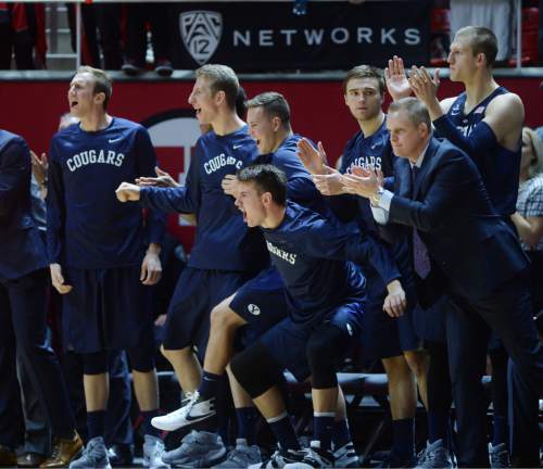 Steve Griffin  |  The Salt Lake Tribune

The BYU bench gets fired up as the Cougars cut into the lead during second half action in the Utah versus BYU men's basketball game at the Huntsman Center in Salt Lake City, Wednesday, December 2, 2015.