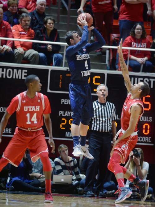 Steve Griffin  |  The Salt Lake Tribune

Brigham Young Cougars guard Nick Emery (4) fires a shot during second half action in the Utah versus BYU men's basketball game at the Huntsman Center in Salt Lake City, Wednesday, December 2, 2015.