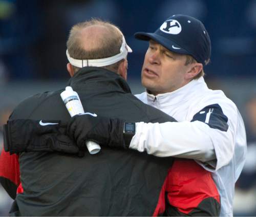 Rick Egan  |  The Salt Lake Tribune

Brigham Young Cougars head coach Bronco Mendenhall hugs Fresno State Bulldogs head coach Tim DeRuyter, after  BYU defeated the Fresno Bulldogs 52 -10, at Lavell Edwards stadium, Tuesday, November 21, 2015.