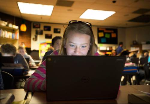 Steve Griffin  |  The Salt Lake Tribune

Brandee Clark, an eighth grader in Melinda Johnston's english class, uses a tablet as the class learns about Anne Frank at Pleasant Grove Junior High School in Pleasant Grove, Utah Thursday, November 12, 2015.