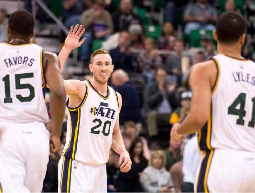 Lennie Mahler  |  The Salt Lake Tribune

Gordon Hayward high-fives Derrick Favors after a three-point bucket in the first half of an NBA basketball game at Vivint Smart Home Arena on Saturday, Dec. 5, 2015.