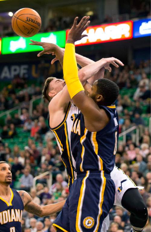 Lennie Mahler  |  The Salt Lake Tribune

Gordon Hayward draws a hard foul from C.J. Miles in the first half of an NBA basketball game at Vivint Smart Home Arena on Saturday, Dec. 5, 2015.