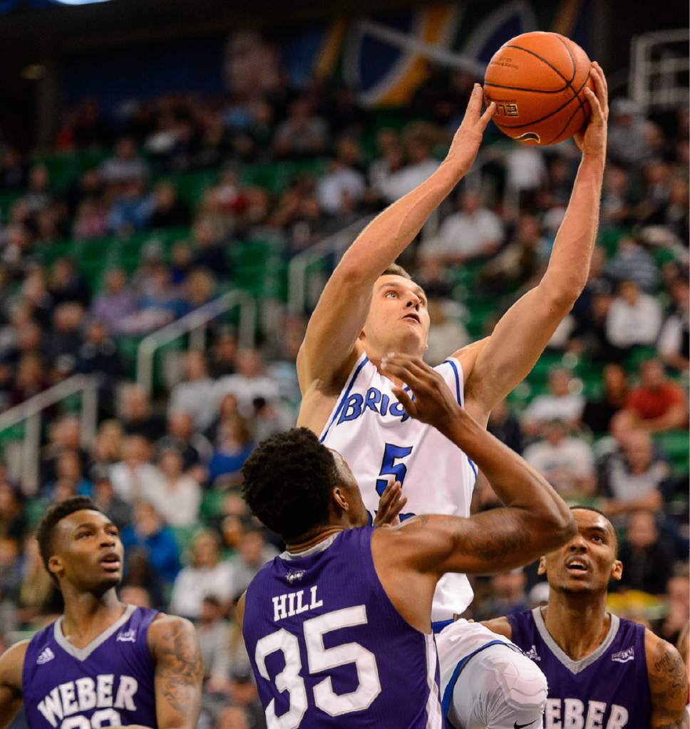 Trent Nelson  |  The Salt Lake Tribune
BYU's Kyle Collinsworth puts up a shot as BYU faces Weber State, NCAA basketball at Vivant Smart Home Arena in Salt Lake City, Saturday December 5, 2015.
