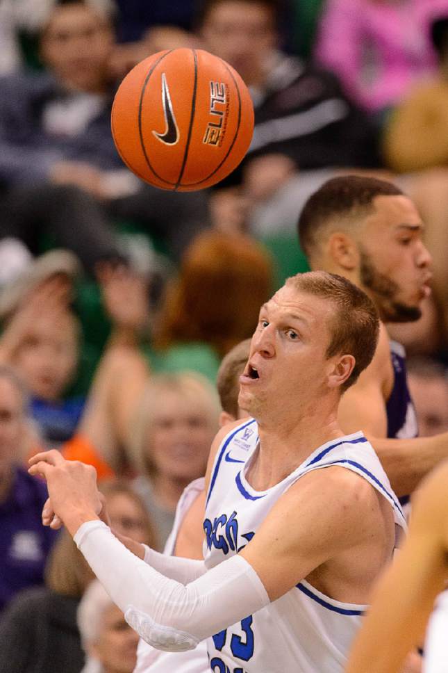 Trent Nelson  |  The Salt Lake Tribune
BYU's Nate Austin goes for the rebound as BYU faces Weber State, NCAA basketball at Vivant Smart Home Arena in Salt Lake City, Saturday December 5, 2015.