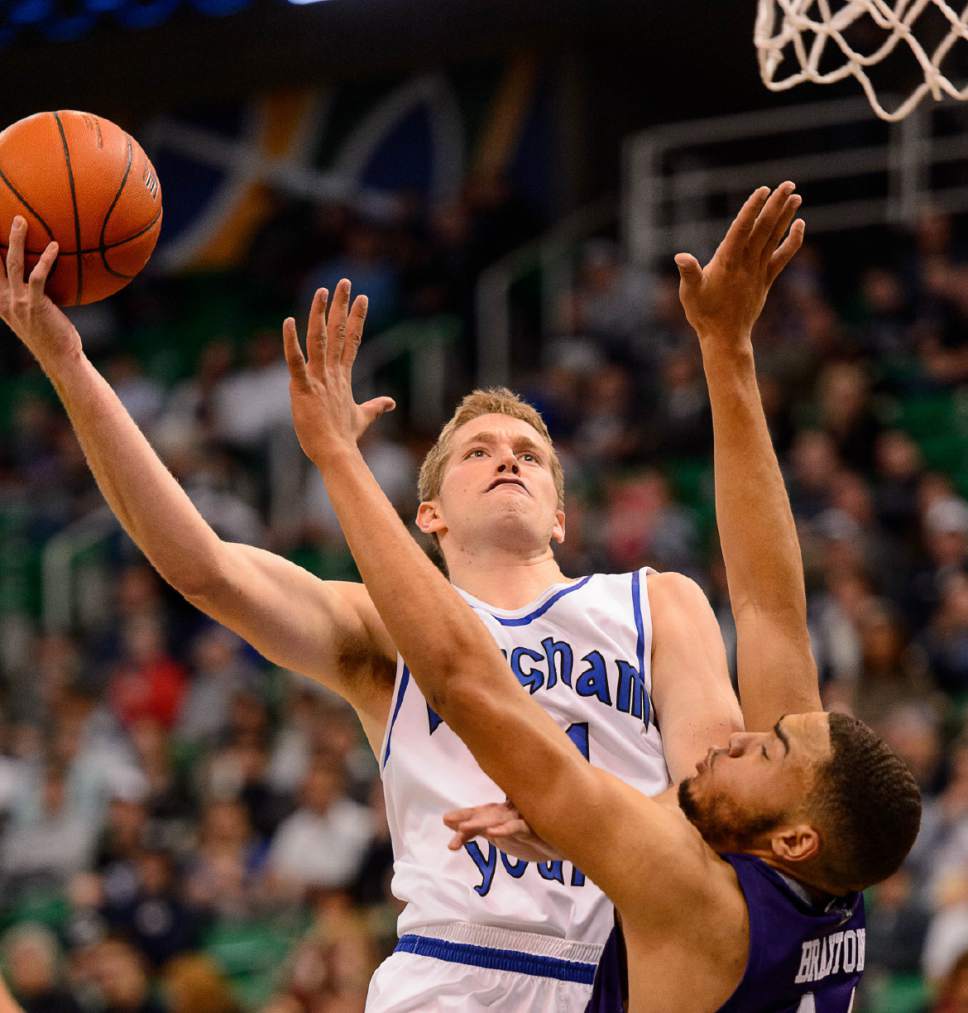 Trent Nelson  |  The Salt Lake Tribune
BYU's Kyle Davis shoots over Weber State's Zach Braxton as BYU faces Weber State, NCAA basketball at Vivant Smart Home Arena in Salt Lake City, Saturday December 5, 2015.