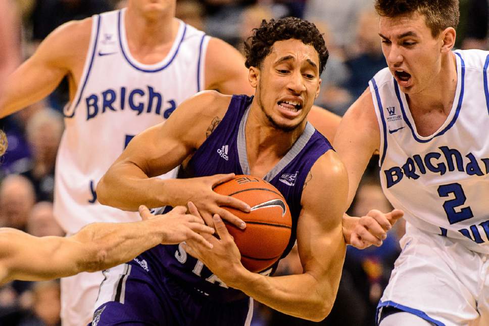 Trent Nelson  |  The Salt Lake Tribune
Weber State's Jeremy Singling drives on BYU's Zac Seljaas, as BYU faces Weber State, NCAA basketball at Vivant Smart Home Arena in Salt Lake City, Saturday December 5, 2015.