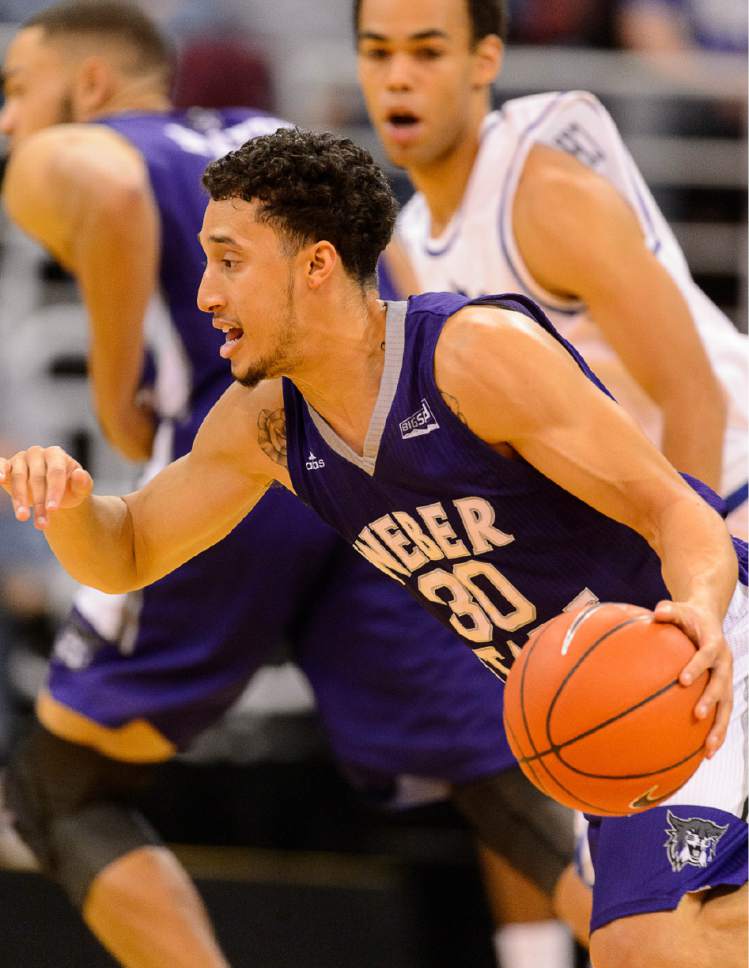 Trent Nelson  |  The Salt Lake Tribune
Weber State's Jeremy Snglin dribbles the ball as BYU faces Weber State, NCAA basketball at Vivant Smart Home Arena in Salt Lake City, Saturday December 5, 2015.