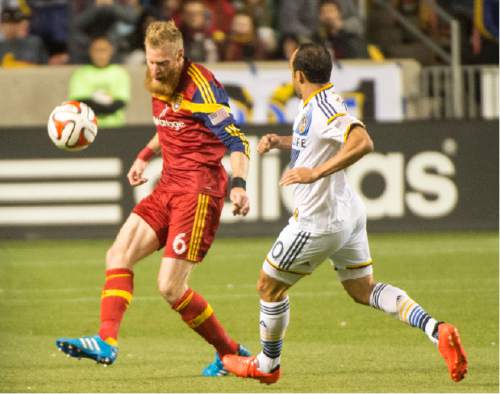 Rick Egan  |  The Salt Lake Tribune

Real Salt Lake defender Nat Borchers (6) kicks the ball as Los Angeles Galaxy's Landon Donovan (10) defends, in MLS playoff action, Real Salt Lake vs. The LA Galaxy at Rio Tinto Stadium,  Saturday, November 1, 2014