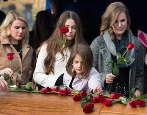 Steve Griffin  |  The Salt Lake Tribune

Family and friends place roses on the casket of former Gov. Olene Walker during graveside services for the beloved former governor Friday, December 4, 2015.