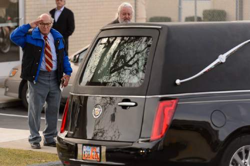 Trent Nelson  |  The Salt Lake Tribune
George Zinn salutes the hearse following the funeral of former of former Utah Governor Olene Walker in Salt Lake City, Friday December 4, 2015. Walker was the first woman to occupy the state's top office. She died Saturday 11/28 at the age of 85 from natural causes.