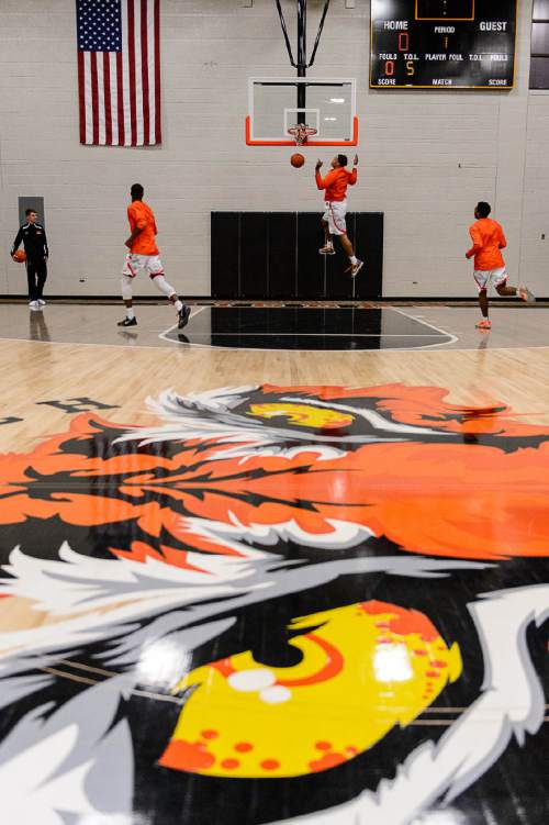 Trent Nelson  |  The Salt Lake Tribune
Wasatch Academy basketball players warm up before facing North Sevier High School, boys basketball, in Mt. Pleasant, Tuesday November 24, 2015.