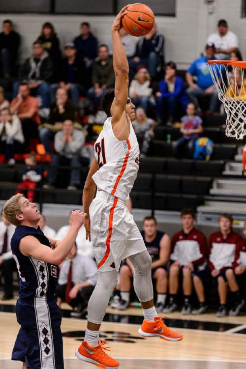 Trent Nelson  |  The Salt Lake Tribune
Jackson Rowe dunks the ball as Wasatch Academy hosts North Sevier High School, boys basketball, in Mt. Pleasant, Tuesday November 24, 2015.
