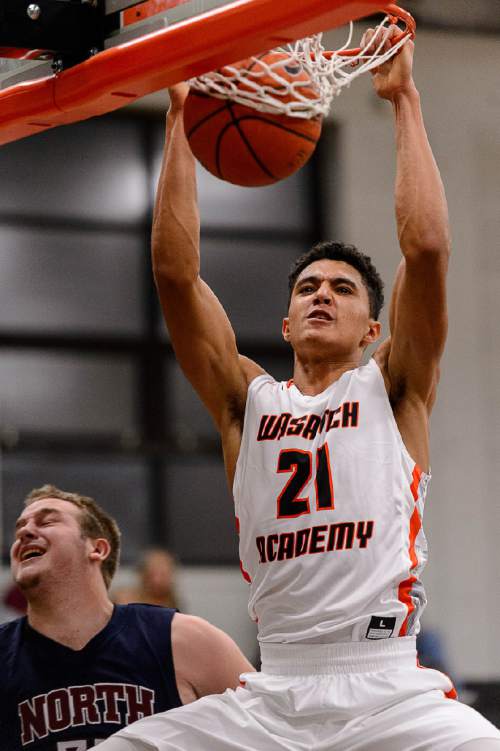 Trent Nelson  |  The Salt Lake Tribune
Jackson Rowe dunks the ball as Wasatch Academy hosts North Sevier High School, boys basketball, in Mt. Pleasant, Tuesday November 24, 2015.