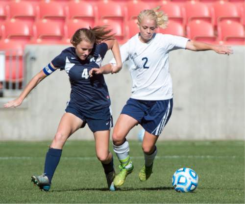 Rick Egan  |  The Salt Lake Tribune

Maeser Prep Lions, Sophie Cannon (4) goes after the ball, along with Millard Eagles Anna Camp (2) in the 2A girls soccer state title game at Rio Tinto Stadium, Saturday, October 24, 2015.