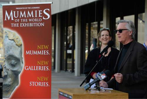 Francisco Kjolseth | The Salt Lake Tribune
Alexandra Hesse, executive director of The Leonardo and Michael Mack, Vice President of Services for Visit Salt Lake, welcome 200 mummies and artifacts under heavy security after making their way through the streets of Salt Lake City for the upcoming "Mummies of the World: The Exhibition." The mummies have traveled more than 2,000 miles from Orlando, Fla. to make their return to Salt Lake City. The return engagement of "Mummies of the World" in Salt Lake City will be featuring new mummies, new galleries and new stories, many never before-seen in the region.