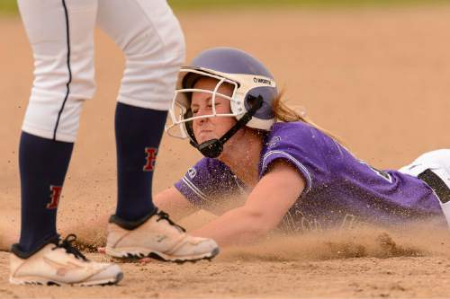 Trent Nelson  |  The Salt Lake Tribune
Lehi's Rylin Roberts slides into second as Herriman faces Lehi in the 5A high school softball championship game, in West Valley City, Friday May 22, 2015.