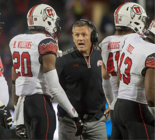 Rick Egan  |  The Salt Lake Tribune

Utah Utes head coach Kyle Whittingham gives some encouragement to Utah Utes defensive back Marcus Williams (20) as they faced a 37-30 defect in double-overtime, in PAC-12 action against the Arizona Wildcats, in Tucson, Saturday, November 14, 2015.