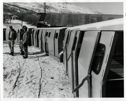 Tribune file photo

The original caption on this 1966 photo says: "Spiro Tunnel Train waits outside the tunnel, just prior to starting its 25 minutes, 15,000 foot ride into the tunnel."