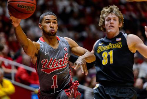 Trent Nelson  |  The Salt Lake Tribune
Utah Utes guard Isaiah Wright (1) passes the ball, defended by Wichita State Shockers guard Ron Baker (31) as the University of Utah Utes host the Wichita State Shockers, college basketball at the Huntsman Center in Salt Lake City, Wednesday December 3, 2014.