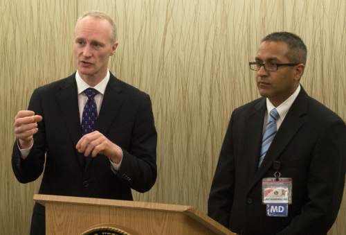 Rick Egan  |  The Salt Lake Tribune

Orthopaedic Trauma and Adult Reconstruction surgeon, Erik Kubiak MD  (left) and Plastic Surgeon, Jay Agarwal, MD (right) discuss the first life-changing Percutaneous Osseointegrated Prosthesis (POP) surgeries that happened Monday at the VA Hospital in Salt Lake, during a press conference at teh VA Hospital, Friday, December 11, 2015.