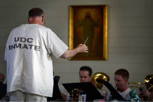 Scott Sommerdorf   |  The Salt Lake Tribune
The Wasatch Music Education Program's orchestra is directed during the annual Christmas concert at the Utah State Prison on Saturday, Dec. 12, 2015.