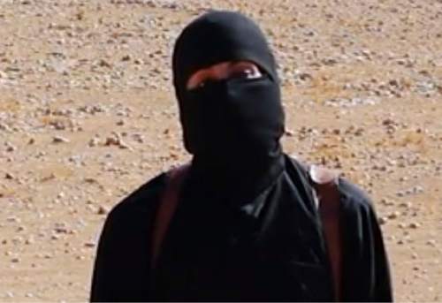 FILE - This still image from undated video released by Islamic State militants on Oct. 3, 2014, purports to show the militant known as Jihadi John. A U.S. drone strike targeted a vehicle in Syria believed to be transporting the masked Islamic State militant known as "Jihadi John" on Thursday, Nov. 12, 2015, according to American officials. Whether the strike killed the British man who appears in several videos depicting the beheadings of Western hostages was not known, officials said. (AP Photo/File)