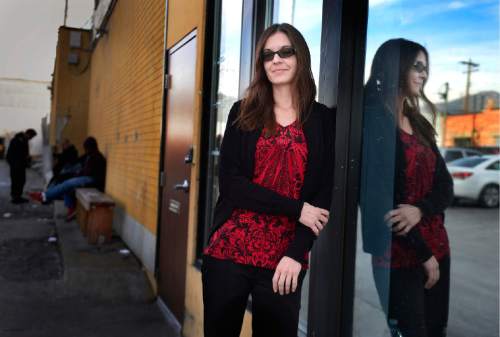 Scott Sommerdorf   |  The Salt Lake Tribune
Nicole Lowe poses near the VOA homeless youth center on State Street, Thursday, December 5, 2015. Lowe was once homeless and a drug user. Now she is an attorney with the A.G.'s office. She donates her own time to help homeless people with legal issues.
