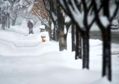 Steve Griffin  |  The Salt Lake Tribune

Snow blowers and shovels were out in force in Salt Lake City as a major storm dumped snow through out the sate Monday, December 14, 2015.