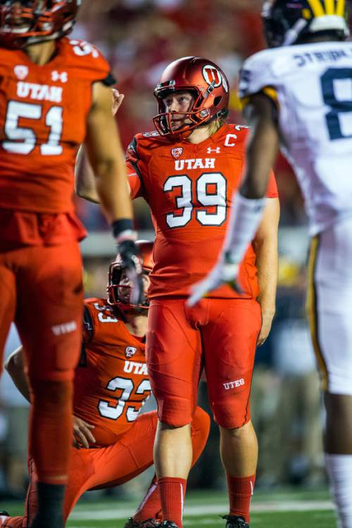 Chris Detrick  |  The Salt Lake Tribune
Utah Utes place kicker Andy Phillips (39) kicks a point after touchdown during the second half of the game at Rice-Eccles Stadium Thursday September 3, 2015.  Utah defeated Michigan 24-17.