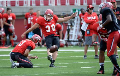 Al Hartmann  |  The Salt Lake Tribune 
Kicker Andy Phillips make an extra point kick during practice at Ute football camp Wednesday August 13.